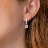 White Gold Diamond Pave Hoops with a 4 prong diamond drop on ear