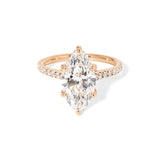 The Alice Marquise lab diamond engagement ring at Princess Bride Diamonds in Huntington Beach, California features a classic pavé diamond band with a cathedral-style setting for a higher, elegant look. It also includes a hidden under-halo beneath the center stone and a diamond bridge for added sparkle from every angle.