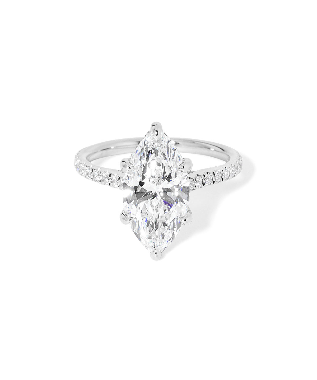 The Alice Marquise lab diamond engagement ring at Princess Bride Diamonds in Huntington Beach, California features a classic pavé diamond band with a cathedral-style setting for a higher, elegant look. It also includes a hidden under-halo beneath the center stone and a diamond bridge for added sparkle from every angle. 14k white gold 
