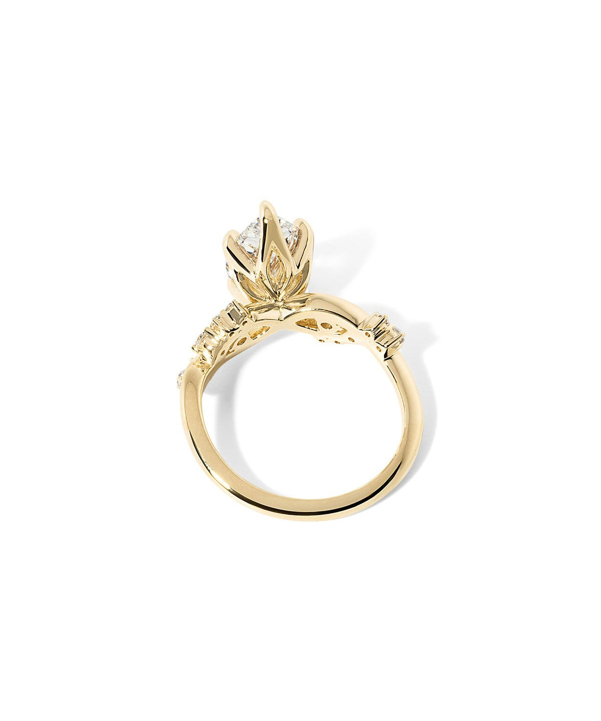 Side profile of the Ariel Pear engagement ring showing diamond bubble side stones and sculpted wave contours at Princess Bride Diamonds jewelry store in Orange County