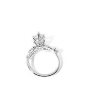 Side profile of the Ariel Pear engagement ring showing diamond bubble side stones and sculpted wave contours at Princess Bride Diamonds jewelry store in Orange County