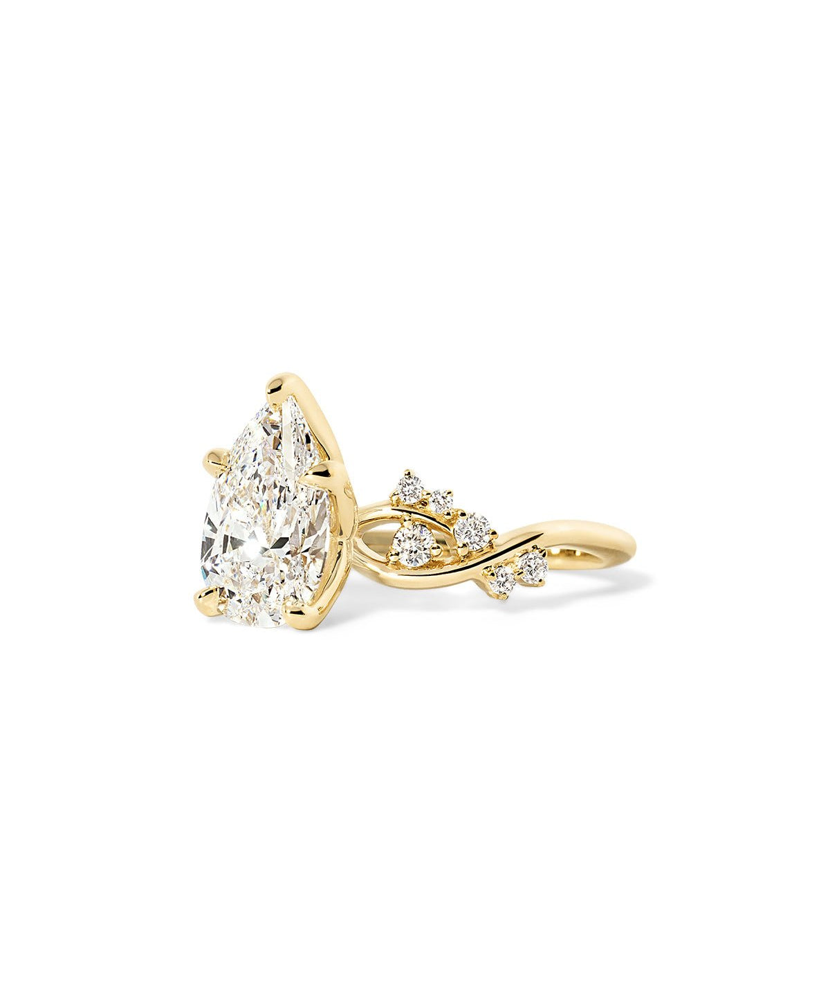 Angled view of the Ariel Pear engagement ring with ocean-inspired design and bubble diamond accents at Princess Bride Diamonds jewelry store in Orange County