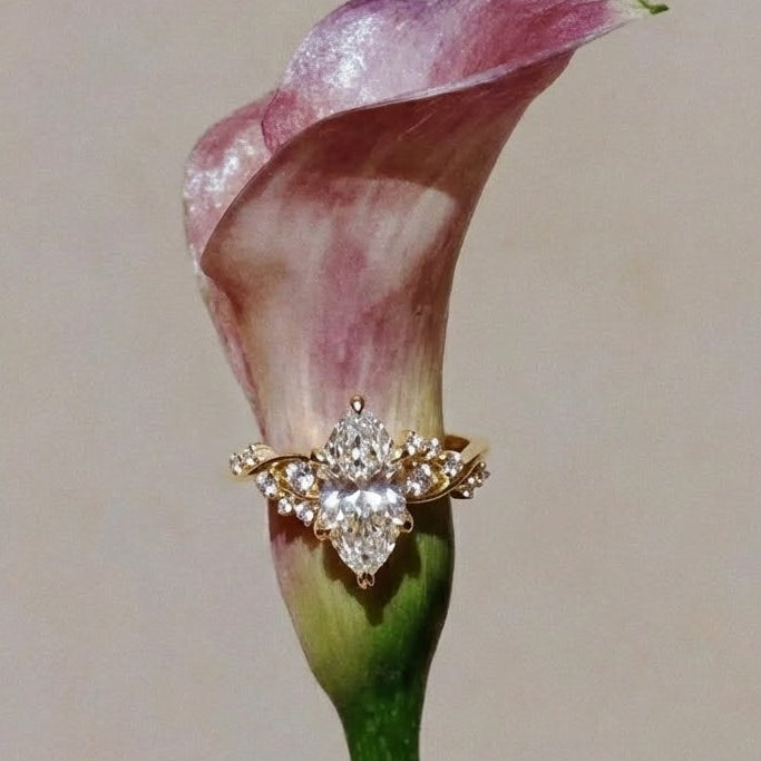 ariel marquise engagement ring on calla lily