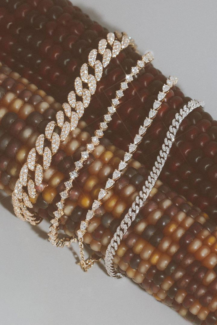 Pavé and tennis diamond bracelets in yellow and white gold