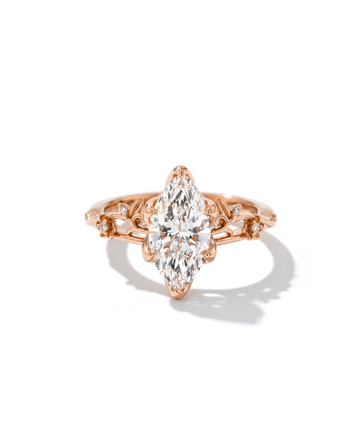 Eryn Marquise engagement ring in 14K rose gold, marquise lab diamond with petal prongs and floating diamonds