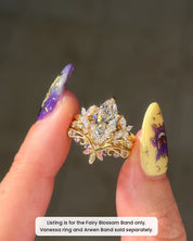 Close-up of the Fairy Blossom Band with the Vanessa engagement ring, sold separately