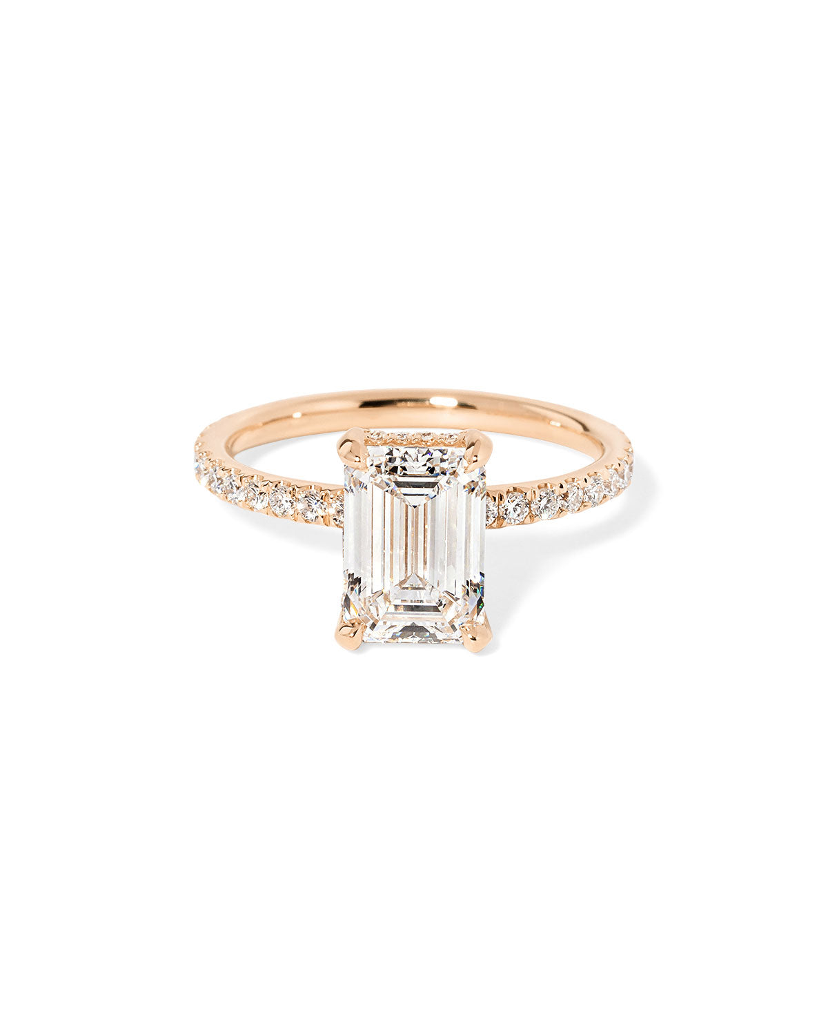 Kayla Emerald Engagement Ring with a diamond hidden halo and classic pave band featuring lab grown diamond side stones in solid yellow gold at princess bride diamonds in huntington beach california rose gold 