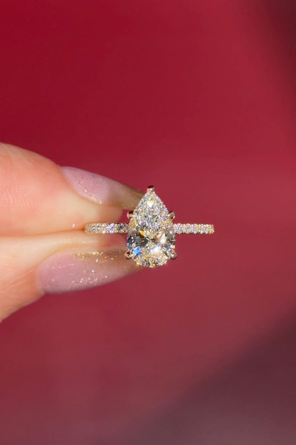 &nbsp;2.00ct D-VVS1 Pear Lab Diamond Kayla. The Kayla is a traditional style body engagement ring with a hidden halo that goes between the prongs, she showcases a classic comfort-fit band, subtly complemented by pave diamonds set on the band.