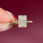 radiant lab diamond yellow gold solitaire engagement ring cathedral setting with diamond bridge