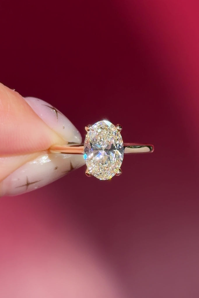 oval lab diamond yellow gold high polish engagement ring with cathedral and hidden halo