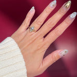 yellow gold marquise lab diamond solitaire split shank engagement ring on hand