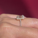 radiant lab diamond halo engagement ring pave yellow gold with diamond bridge and open gallery on hand