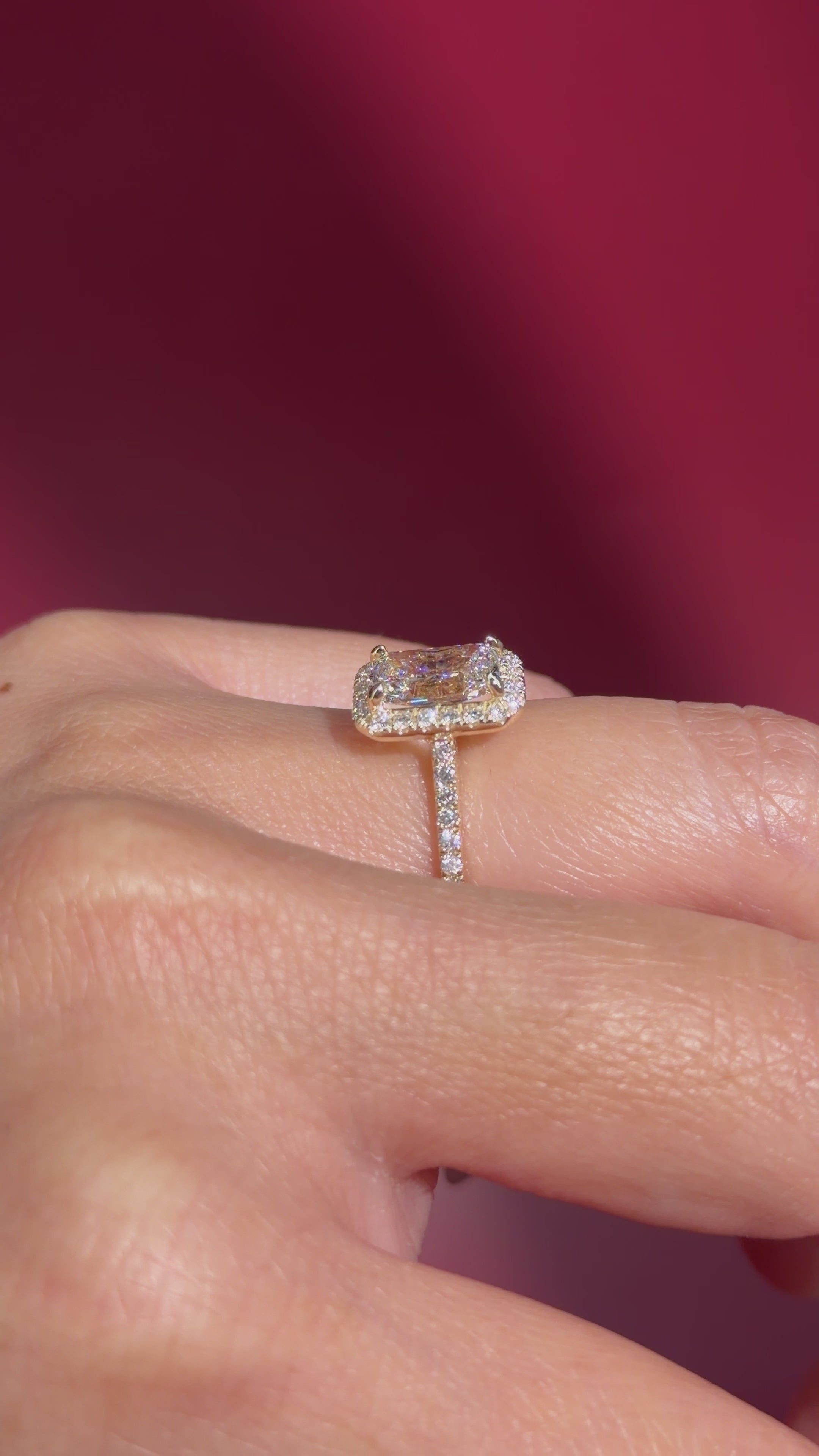 radiant lab diamond halo engagement ring pave yellow gold with diamond bridge and open gallery on hand