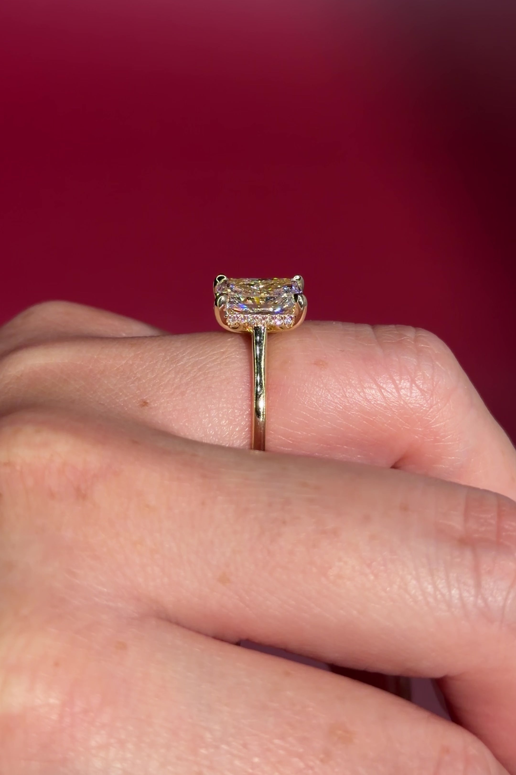 2.50ct D-VS1 Radiant Lab Diamond Alice. The Alice features a classic high polish band with a hidden inner under halo and cathedral-style body with a diamond bridge.