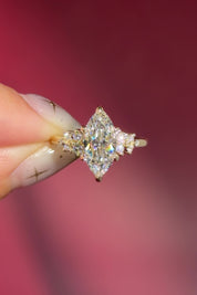 marquise lab diamond yellow gold engagement ring side stone cluster nature inspired