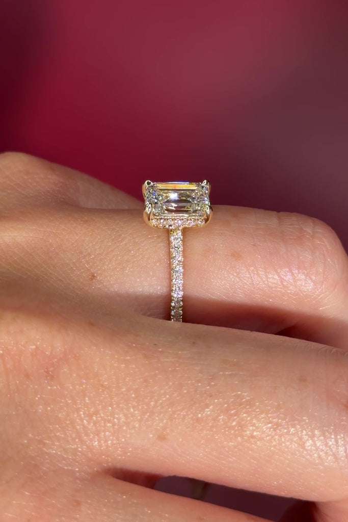 Emerald Cut Lab Diamond Solitaire in Yellow Gold with Pave diamond band and hidden halo