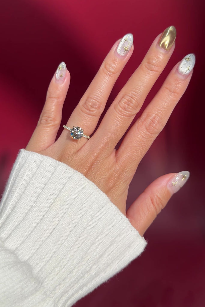 round lab diamond engagement ring yellow gold pavé diamonds with hidden halo on hand