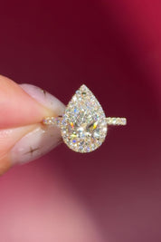 pear lab diamond yellow gold halo engagement ring pave band diamond petal prong basket