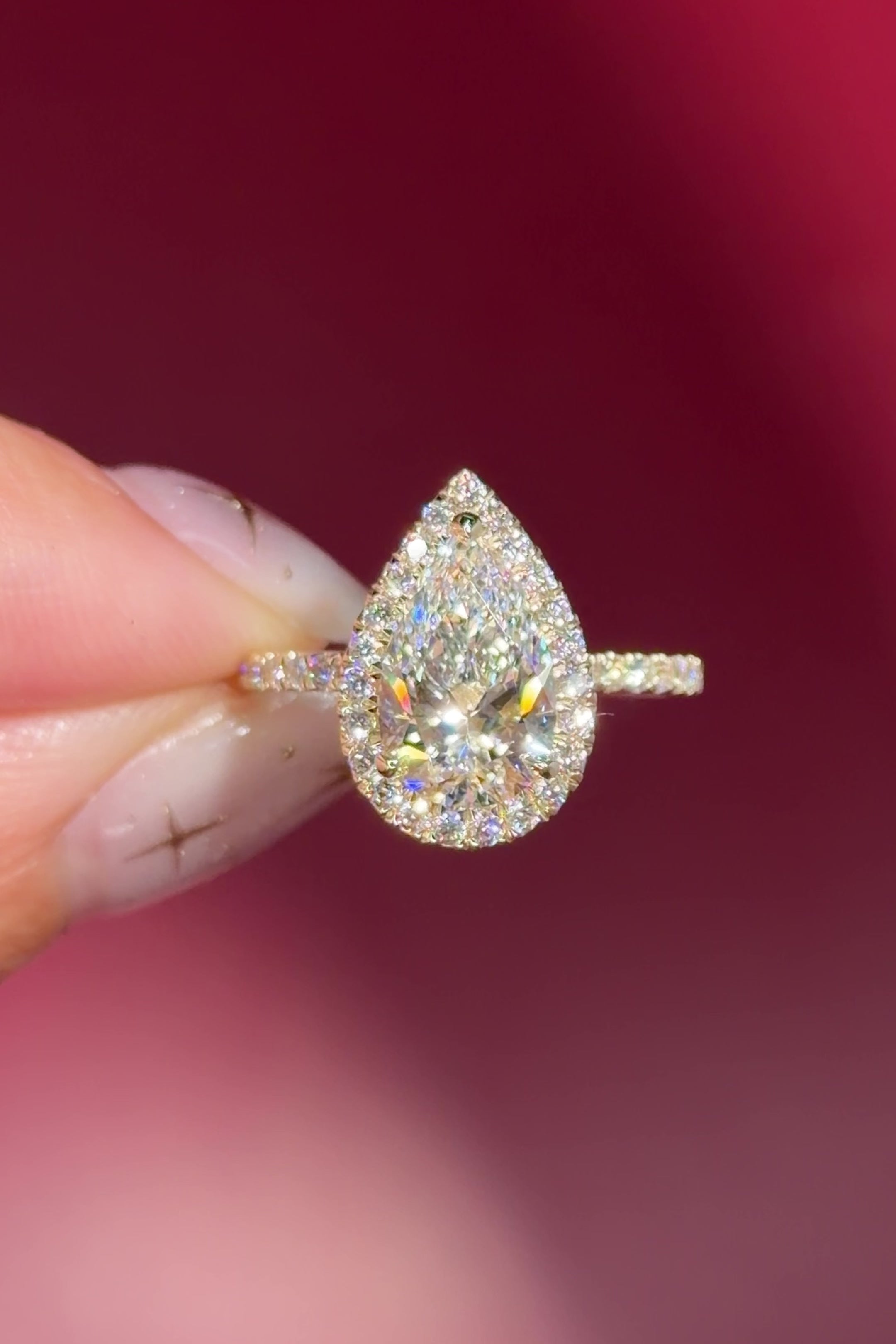 pear lab diamond yellow gold halo engagement ring pave band diamond petal prong basket