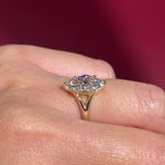 yellow gold marquise lab diamond solitaire split shank engagement ring on hand