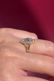 yellow gold marquise lab diamond solitaire split shank engagement ring on hand