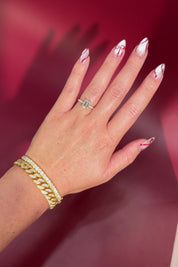 Emerald Cut Lab Diamond Solitaire in Yellow Gold with Pave diamond band and hidden halo