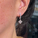 Princess cut Lab Diamond Drop Hoops with pave diamonds in White Gold at princess Bride diamonds jewelry store in huntington beach california on model 