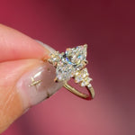 marquise lab diamond yellow gold engagement ring side stone cluster nature inspired