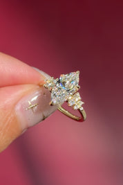 marquise lab diamond yellow gold engagement ring side stone cluster nature inspired