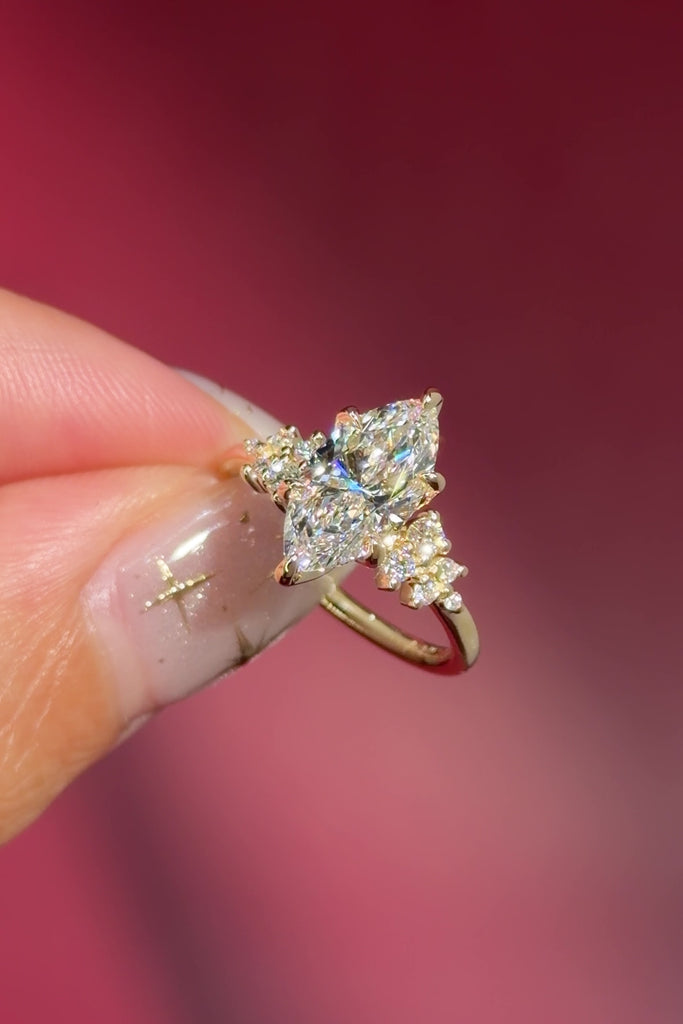 marquise lab diamond yellow gold engagement ring side stone cluster nature inspired