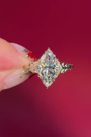 marquise diamond leafy nature inspired yellow gold engagement ring