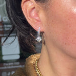 Princess cut Lab Diamond Drop Hoops with pave diamonds in White Gold at princess Bride diamonds jewelry store in huntington beach california on model 