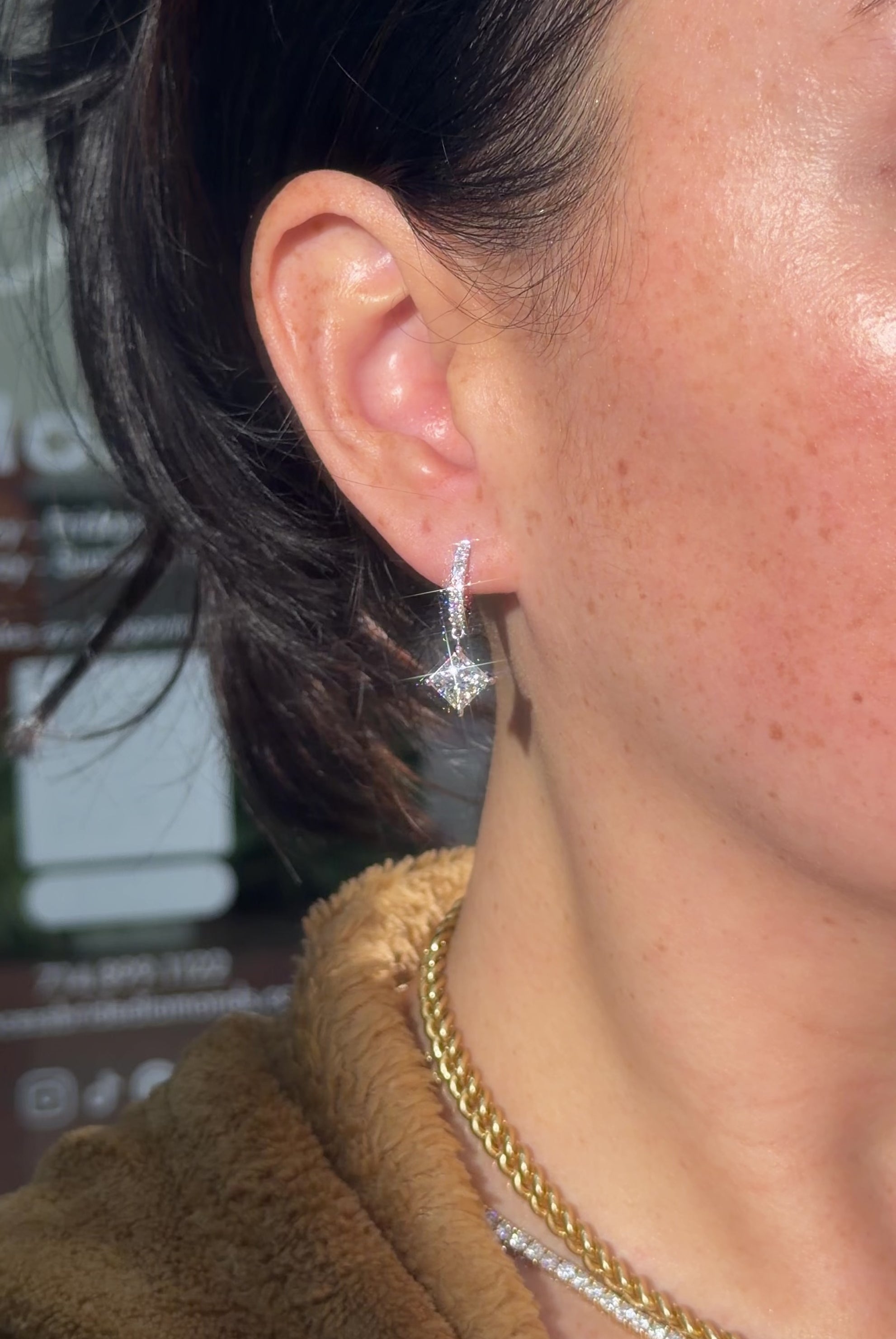 Princess cut Lab Diamond Drop Hoops with pave diamonds in White Gold at princess Bride diamonds jewelry store in huntington beach california on model 