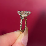 2.09ct D-VVS2 Marquise Lab Diamond Arwen. Nature inspired engagement ring with organic leaves made of gold going up the band to hold the center stone with petal prongs.