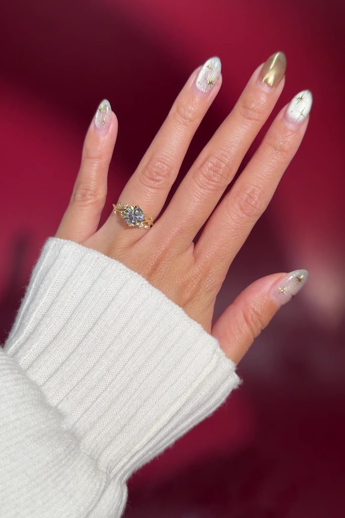 round lab diamond yellow gold engagement ring seaweed leaf nature inspired on hand