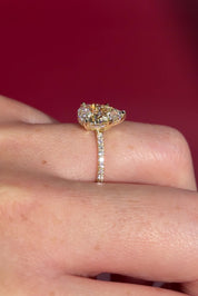 &nbsp;2.00ct D-VVS1 Pear Lab Diamond Kayla. The Kayla is a traditional style body engagement ring with a hidden halo that goes between the prongs, she showcases a classic comfort-fit band, subtly complemented by pave diamonds set on the band.