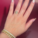 2.74ct E-VS1 Radiant Lab Diamond East West Ring. This is a traditional style engagement ring featuring a wrap under halo and east west radiant cut lab diamonds set into the band. The entire ring is made in solid 14k yellow gold.