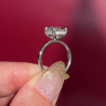 4.07ct D-VS1 Oval Lab Diamond Kayla Oval lab diamond solitaire in white gold with a wrap under halo and high polish plain band.