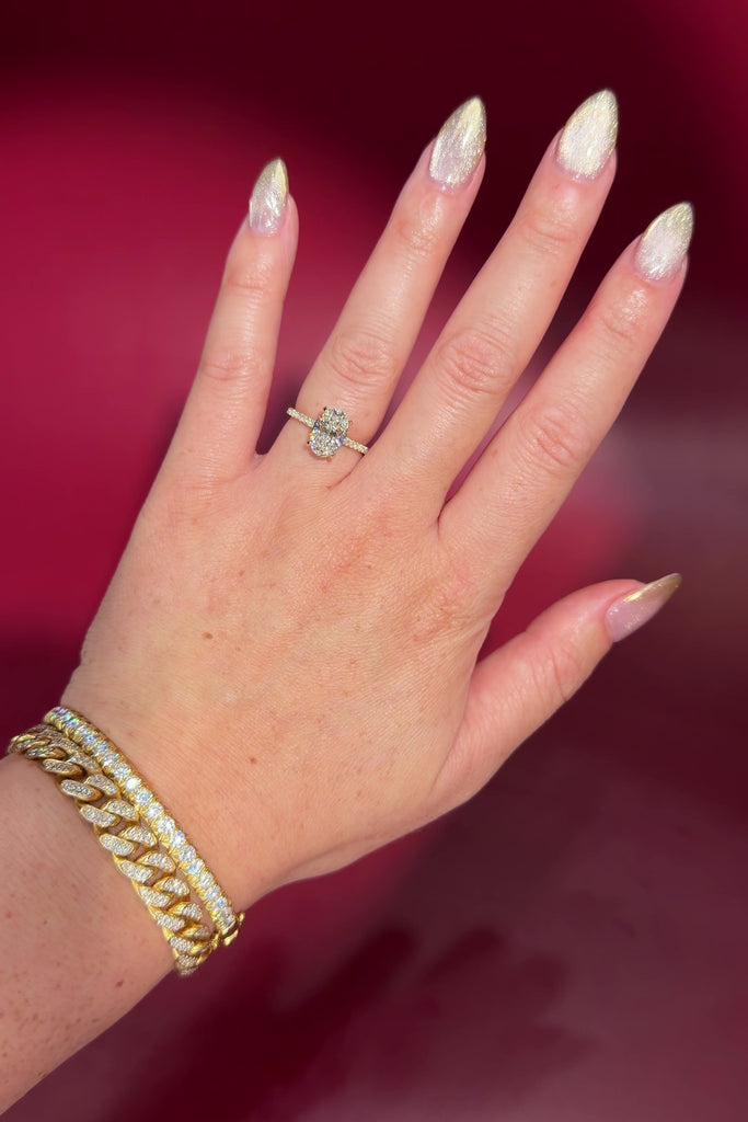 2.06ct D-VS1 Oval Lab Diamond Michelle. Cathedral style engagement ring with pavé diamonds going 75% around the ring, hidden halo, and high polish plain bridge made in solid 14k yellow gold.