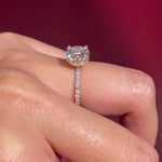 round lab diamond engagement ring yellow gold pavé diamonds with hidden halo on hand