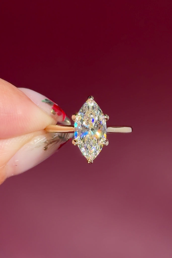 marquise lab diamond yellow gold cathedral setting high polish solitaire engagement ring