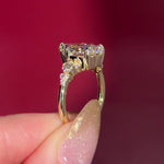 3.03ct D-VVS2 Pear Lab Diamond Brandi.

The Brandi is an inline style engagement ring featuring a symmetrical cluster of side diamonds that create a bold, sculptural look&nbsp;

Because of its inline design, straight wedding bands will not stack flush. This style pairs best with a curved or custom wedding band, or it can be worn beautifully on its own without a wedding band at all&nbsp;

A striking choice for those who love a statement engagement ring with intentional design details.