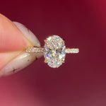 oval lab diamond engagement ring pave band hidden halo yellow gold