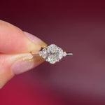 1.01ct D-VS1 Oval Lab Diamond Lindsey. The Lindsey features a classic high polish band with a trio of diamond side stones to perfectly accent your selected center stone.