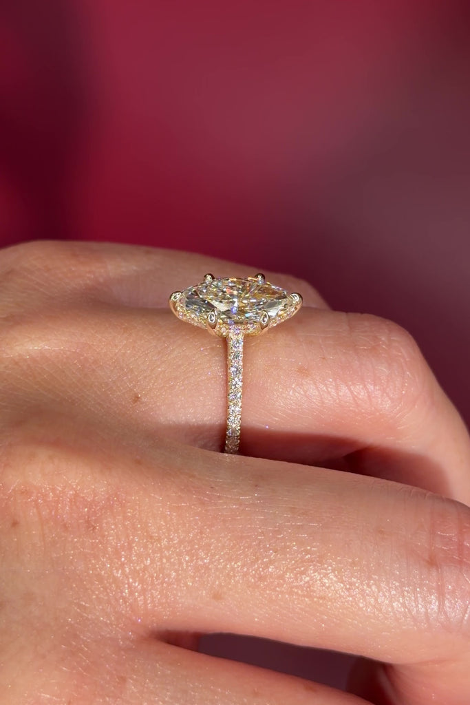 Marquise Solitaire Engagement Ring with Pave Diamond Band in Yellow Gold Cathedral Style with hidden halo