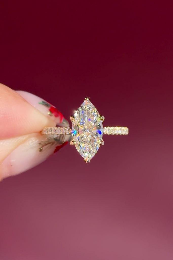 marquise lab diamond engagement ring yellow gold pave diamond band cathedral setting