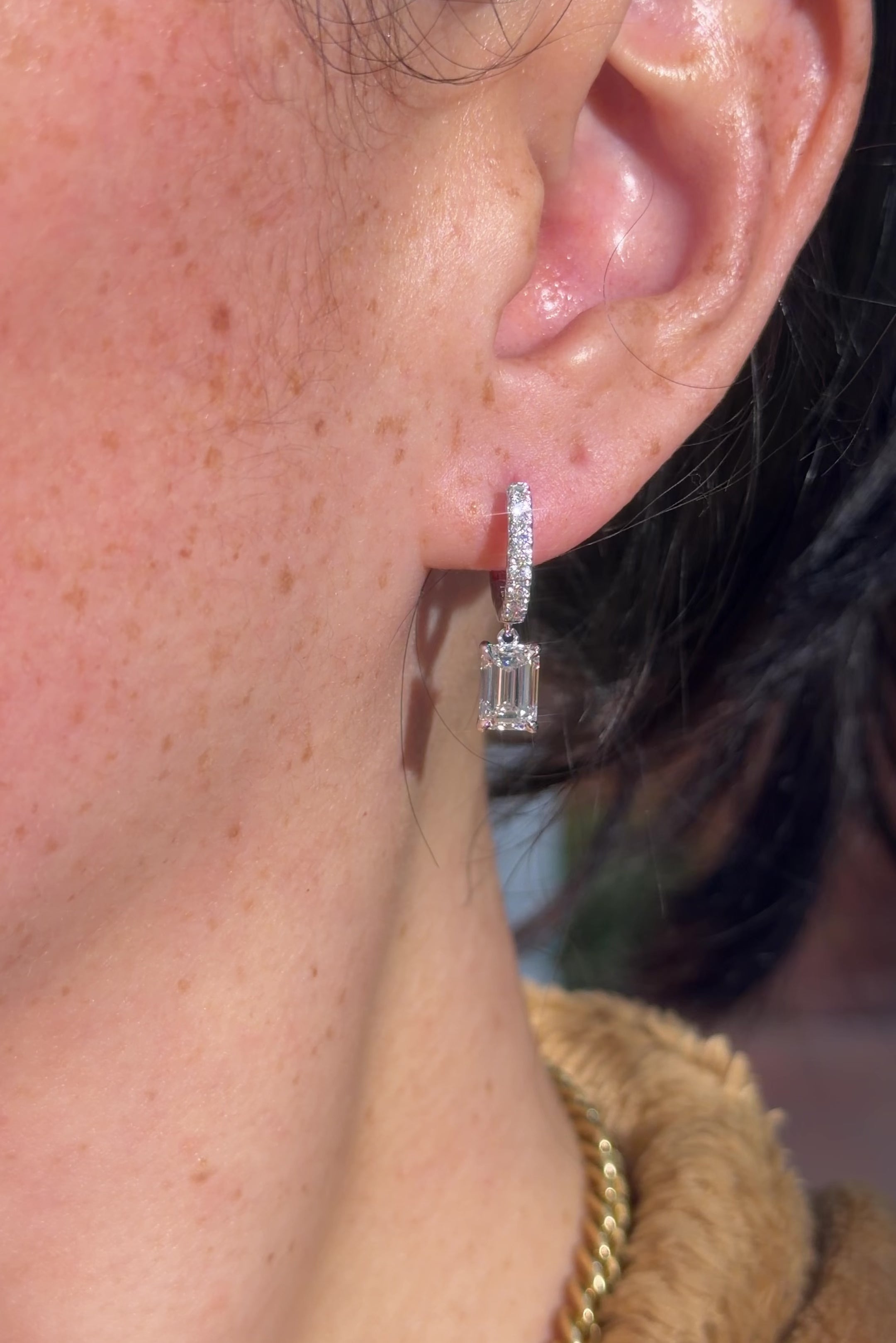 Emerald Diamond Drop Hoops White Gold with pave hoops dangle earrings with seamless click closure at princess bride diamonds in huntington beach california on model