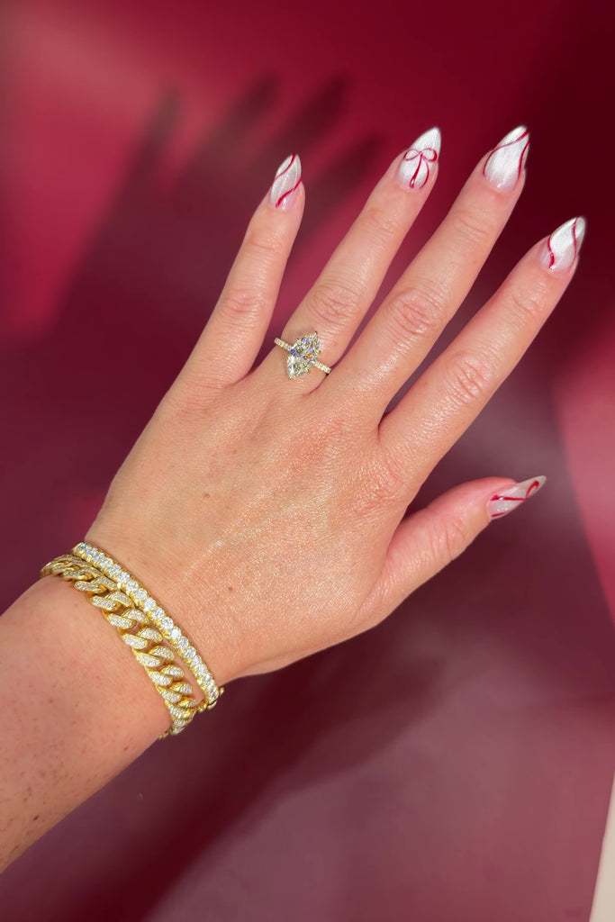 Marquise Solitaire Engagement Ring with Pave Diamond Band in Yellow Gold Cathedral Style with hidden halo