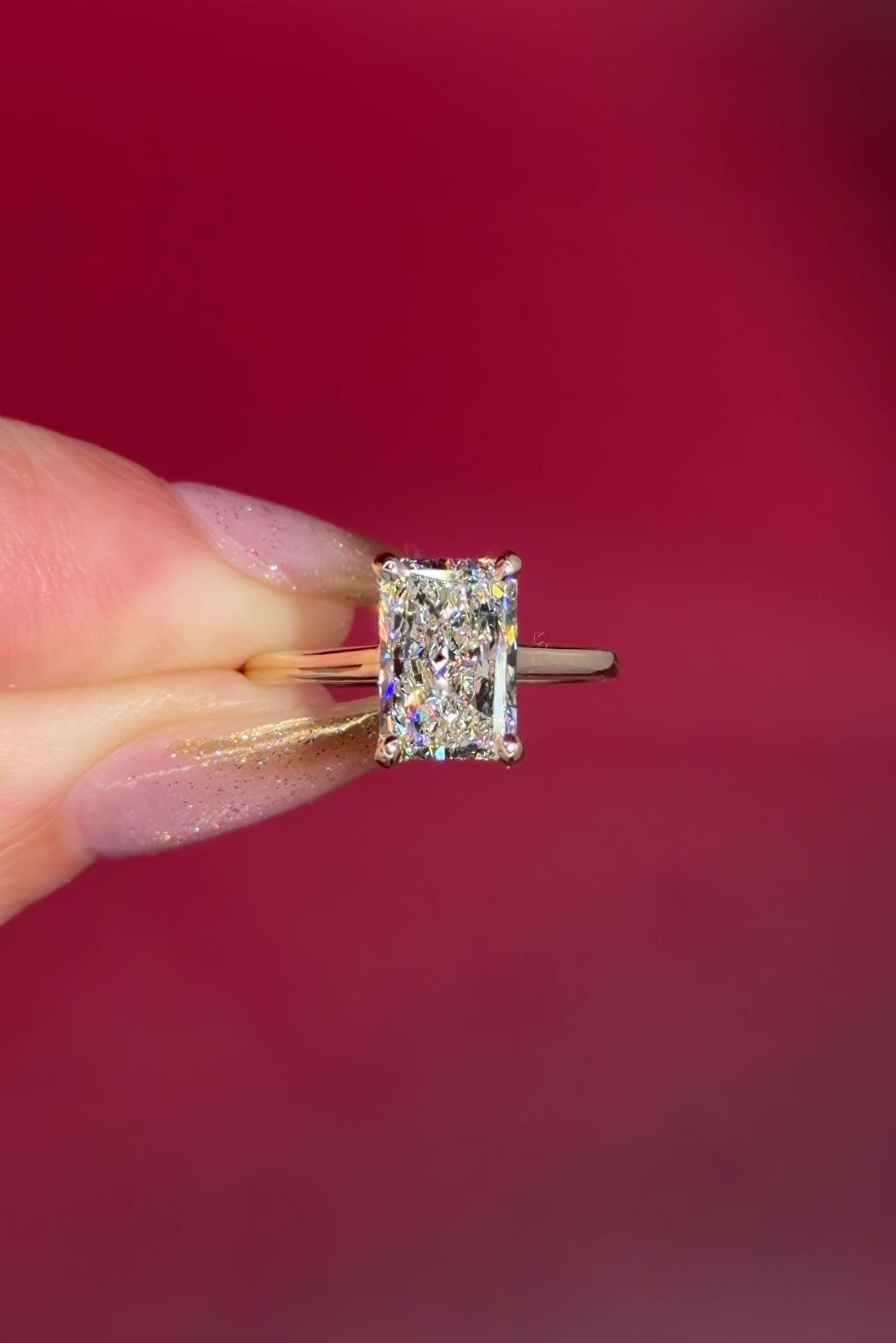 2.50ct D-VS1 Radiant Lab Diamond Alice. The Alice features a classic high polish band with a hidden inner under halo and cathedral-style body with a diamond bridge.