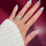 radiant lab diamond halo engagement ring pave yellow gold with diamond bridge and open gallery on hand